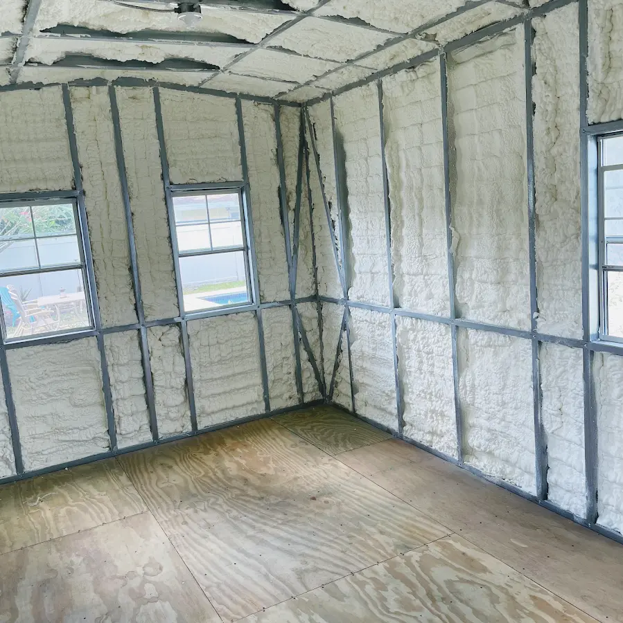Closed-cell spray foam insulation applied to wall cavities in a residential project in Bay Point